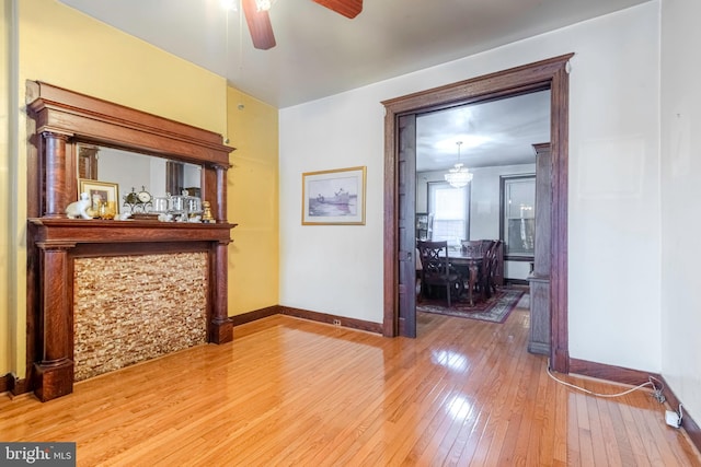 interior space with light hardwood / wood-style floors and ceiling fan