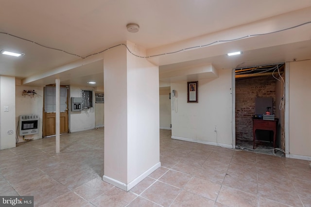 basement featuring light tile floors