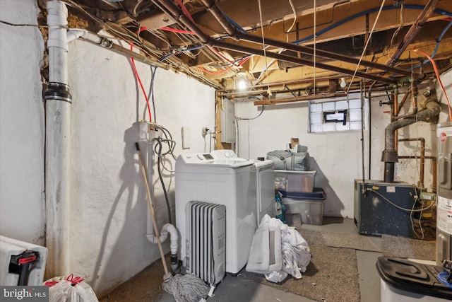 basement with washing machine and clothes dryer