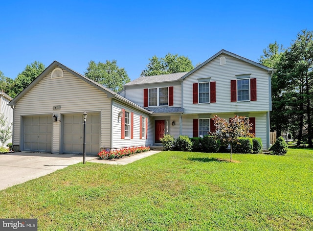 front facade featuring a garage and a front lawn