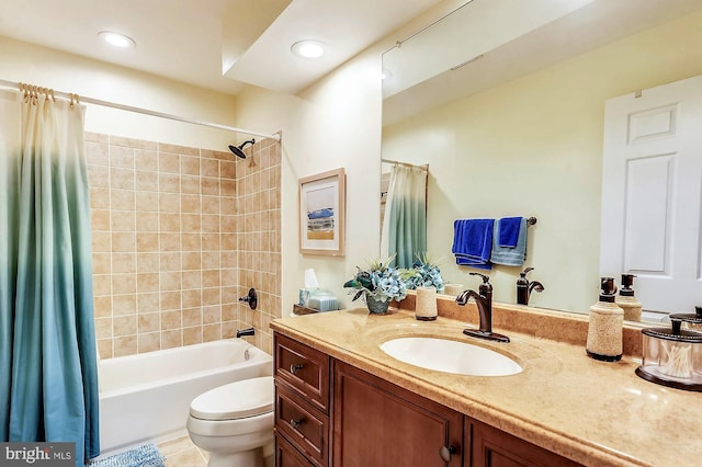 full bathroom featuring vanity, toilet, and shower / bath combo with shower curtain