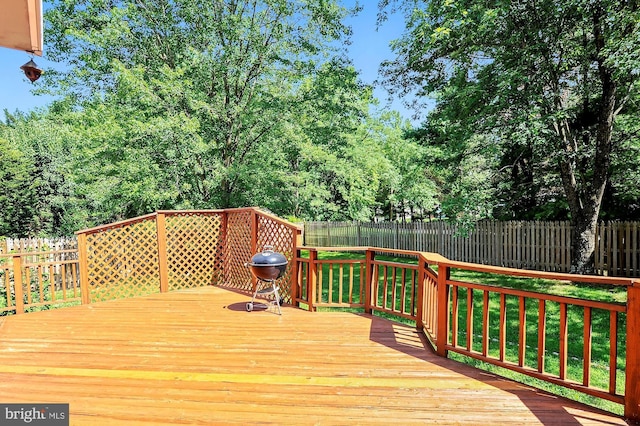 wooden terrace with area for grilling