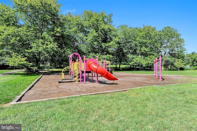 view of jungle gym with a yard