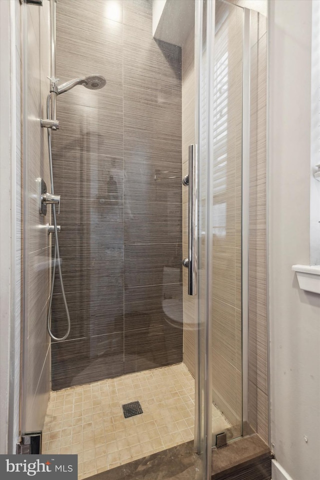 bathroom featuring walk in shower