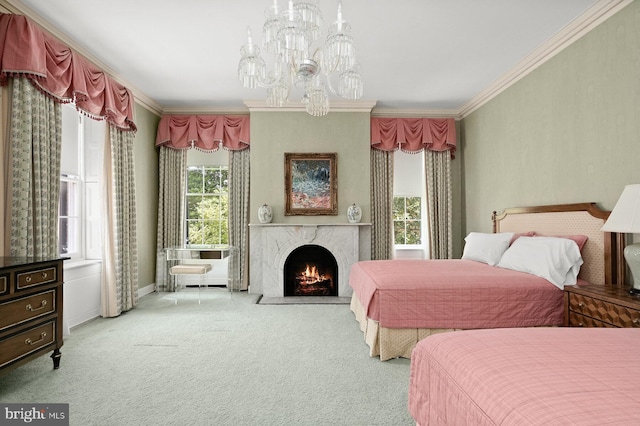 carpeted bedroom with ornamental molding, a notable chandelier, multiple windows, and a fireplace