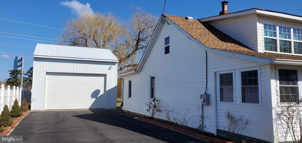 view of side of property featuring a garage