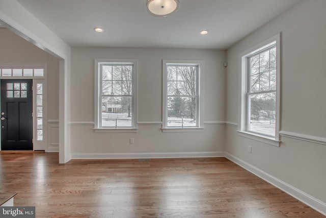 entrance foyer with light hardwood / wood-style floors