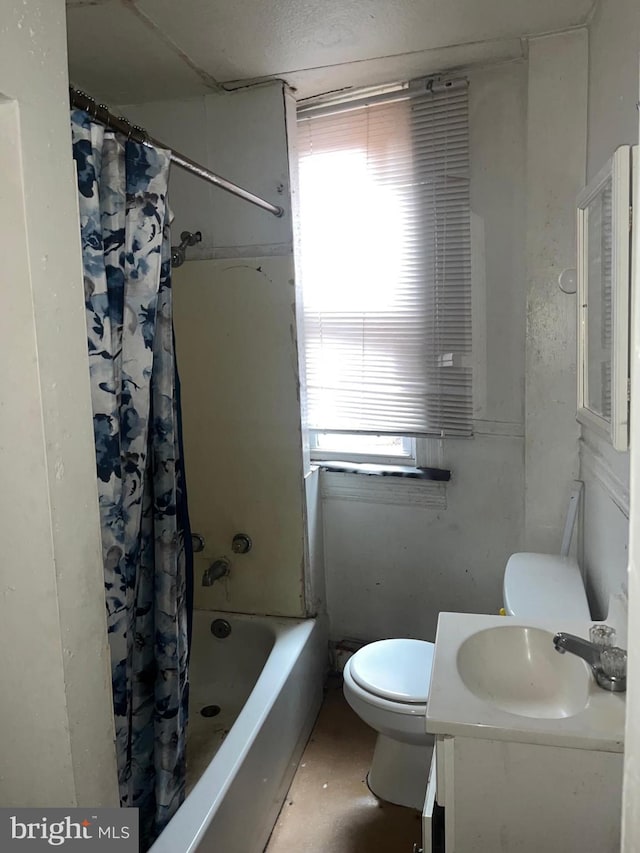 full bathroom with shower / bath combination with curtain, toilet, and vanity