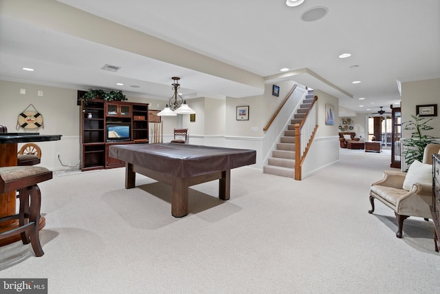 rec room with light carpet, pool table, and ornamental molding