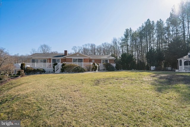 view of yard featuring a deck