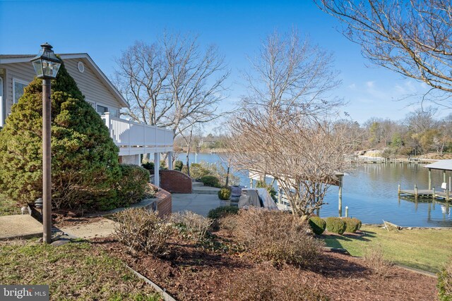 view of dock with a water view