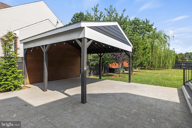 exterior space with a carport