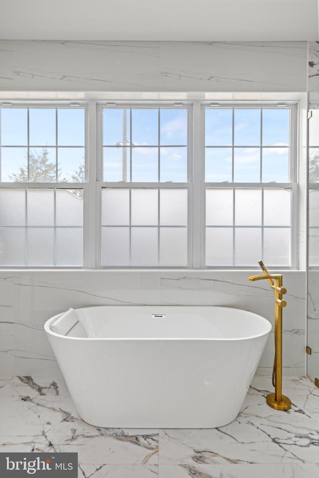 bathroom featuring a tub