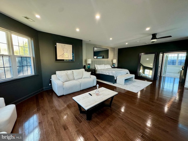 bedroom featuring ceiling fan and dark hardwood / wood-style flooring