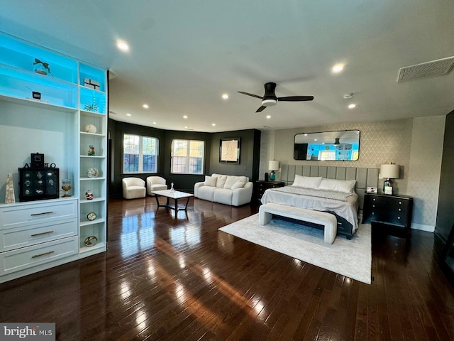 bedroom with dark wood-type flooring and ceiling fan