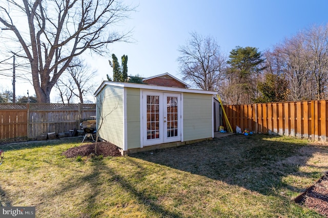 view of outdoor structure featuring a yard