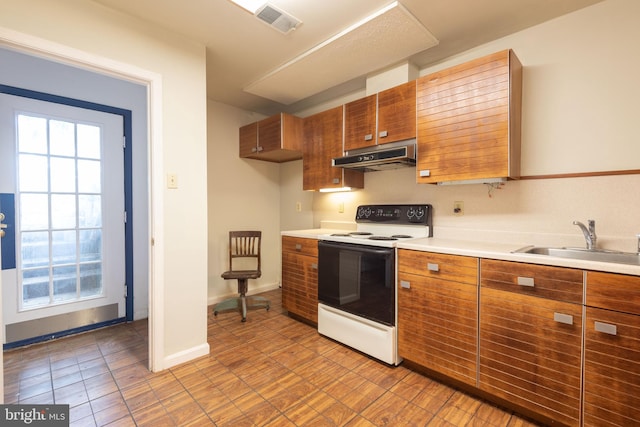 kitchen with tile flooring, sink, and white electric stove