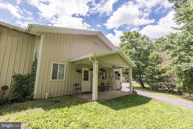 view of property exterior featuring a yard