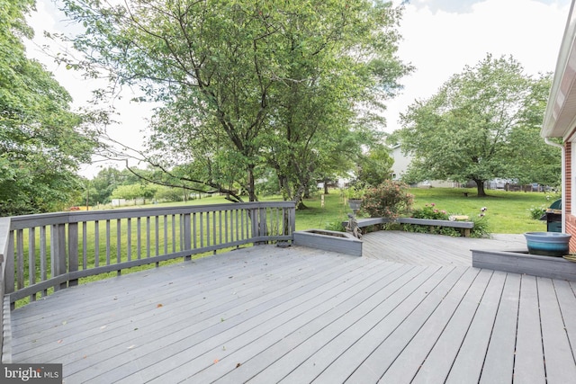 deck featuring a yard