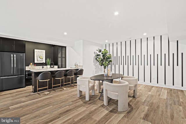 dining room with light hardwood / wood-style floors