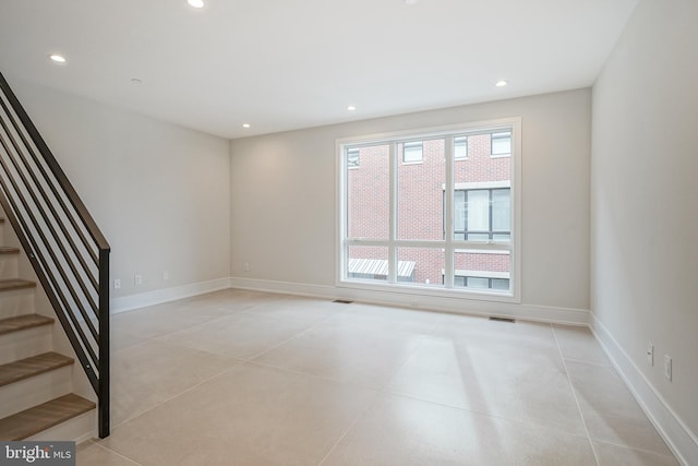 view of tiled spare room