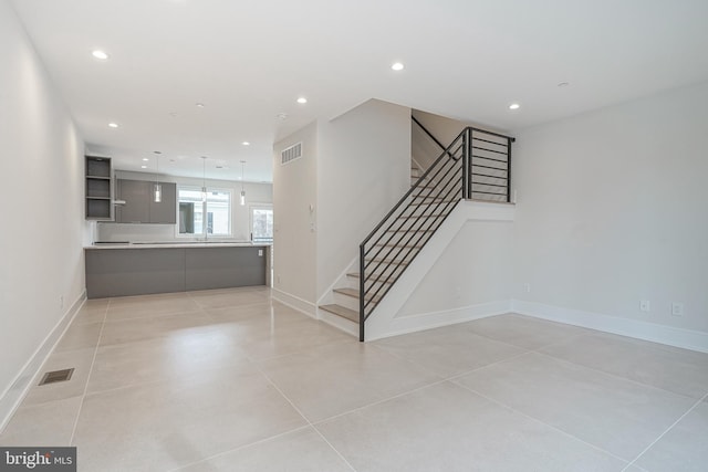 interior space with light tile patterned flooring