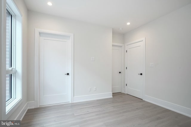 empty room featuring light hardwood / wood-style floors