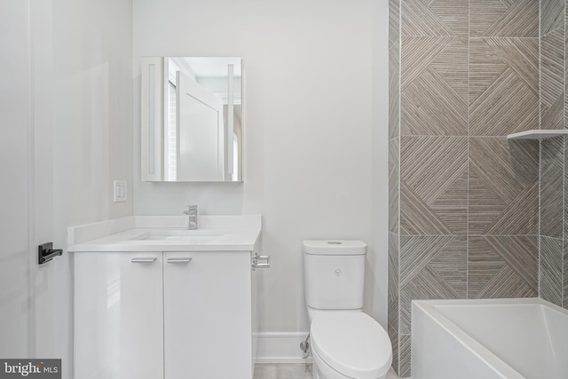 bathroom featuring a shower, vanity, and toilet