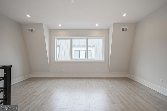 empty room with light wood-type flooring