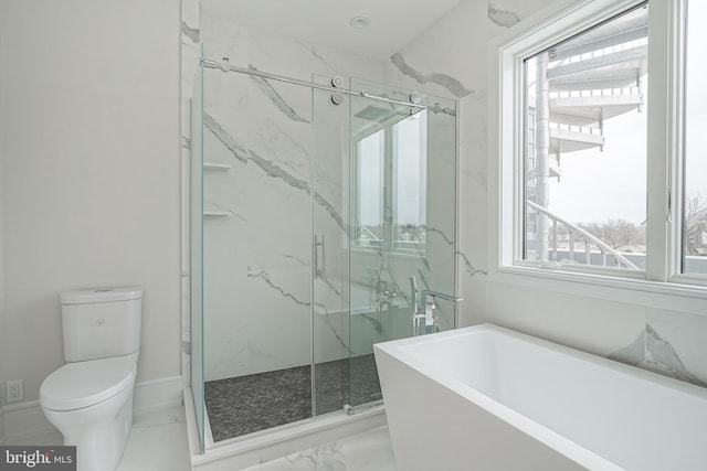 bathroom featuring toilet and shower with separate bathtub