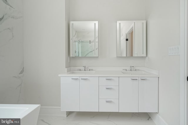 bathroom featuring vanity and tiled shower