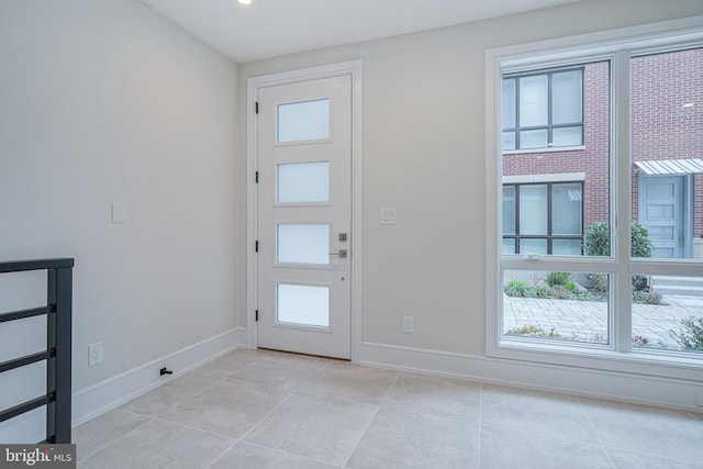 view of tiled foyer entrance