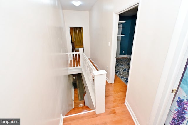 corridor featuring light wood-type flooring