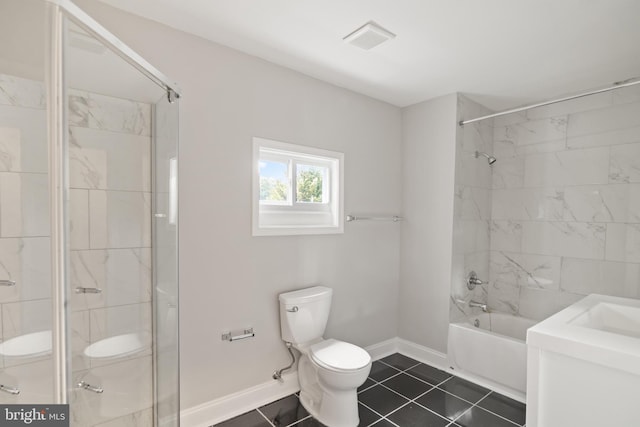 full bathroom with toilet, vanity, tile patterned flooring, and tiled shower / bath