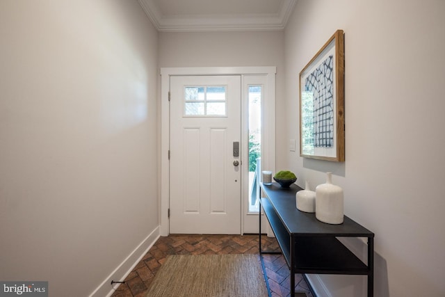 foyer entrance featuring ornamental molding