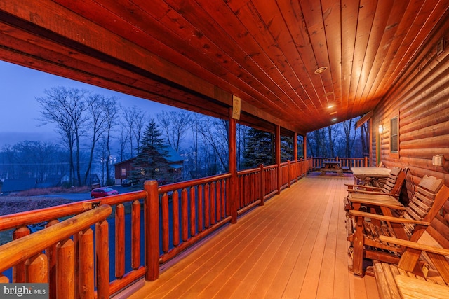 view of deck at dusk