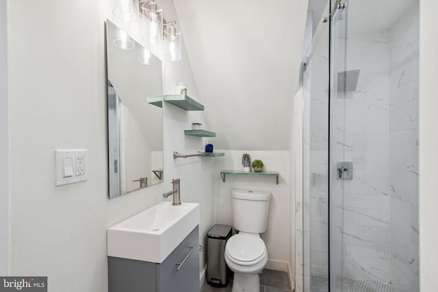 bathroom featuring vanity, tile flooring, a shower with door, and toilet