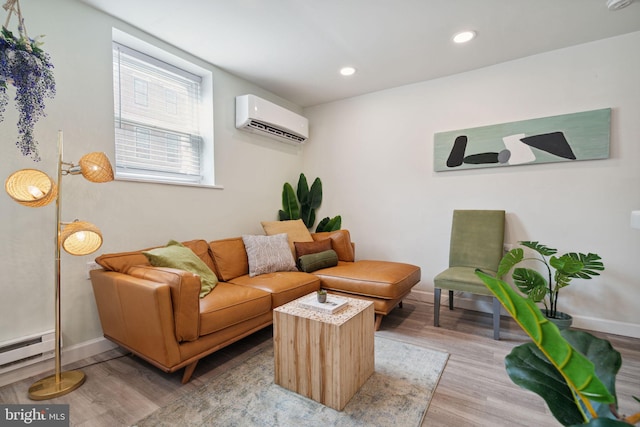 living room featuring a baseboard radiator, a wall unit AC, and light wood-type flooring