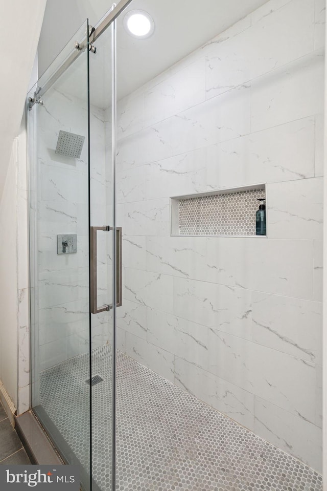 bathroom featuring walk in shower