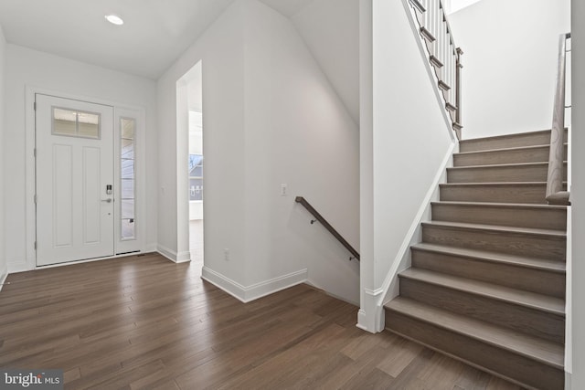 entrance foyer with dark hardwood / wood-style flooring