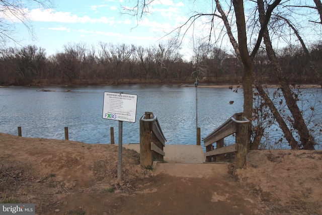 dock area featuring a water view