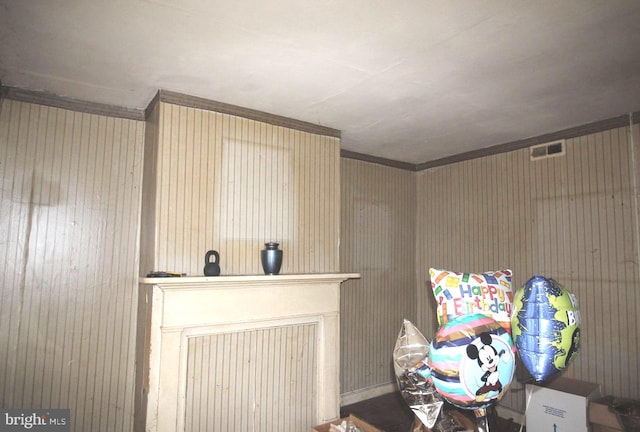 misc room with ornamental molding