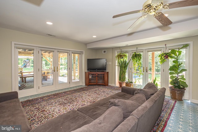 3111 Burnt House Hill Rd, Doylestown, PA 18902 - tiled living room with french doors and ceiling fan