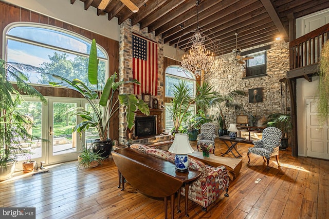 3111 Burnt House Hill Rd, Doylestown, PA 18902 - living room with a notable chandelier, a high ceiling, beam ceiling, and hardwood / wood-style flooring