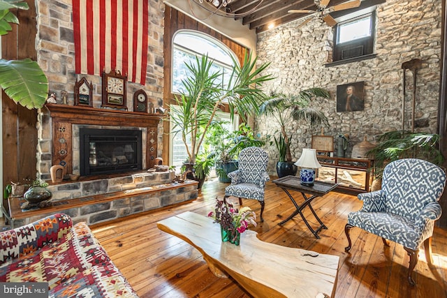 3111 Burnt House Hill Rd, Doylestown, PA 18902 - living room with a healthy amount of sunlight, a high ceiling, hardwood / wood-style floors, and ceiling fan