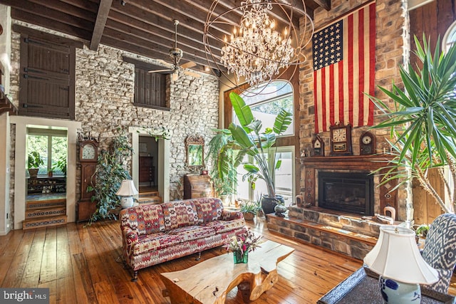 3111 Burnt House Hill Rd, Doylestown, PA 18902 - living room featuring dark hardwood / wood-style floors, a large fireplace, and a towering ceiling