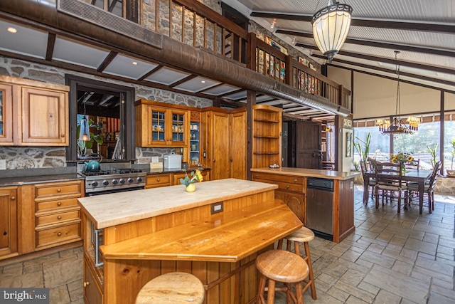 3111 Burnt House Hill Rd, Doylestown, PA 18902 - kitchen with gas stove, pendant lighting, a kitchen island, a chandelier, and butcher block counters