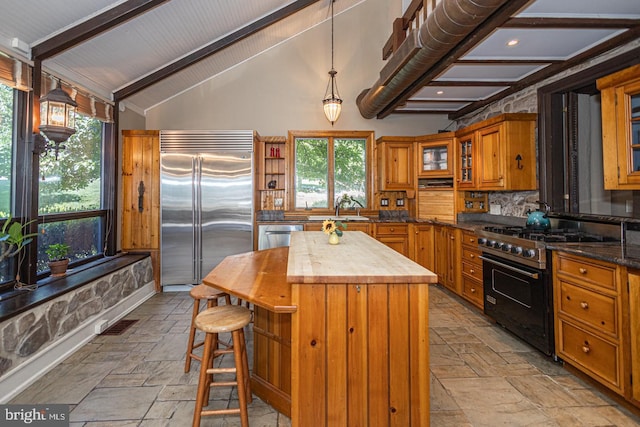 3111 Burnt House Hill Rd, Doylestown, PA 18902 - kitchen with premium appliances, backsplash, light tile floors, a kitchen island, and pendant lighting