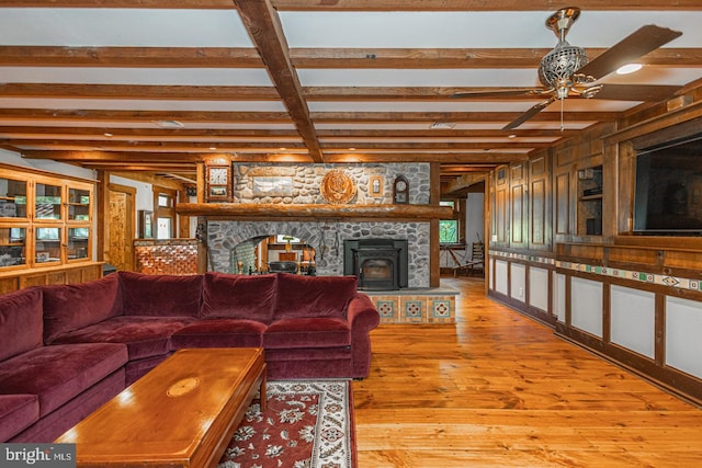 3111 Burnt House Hill Rd, Doylestown, PA 18902 - living room with light wood-type flooring, beam ceiling, ceiling fan, and a fireplace