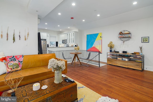 living room with hardwood / wood-style flooring